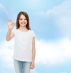 Image showing smiling little girl in white blank t-shirt