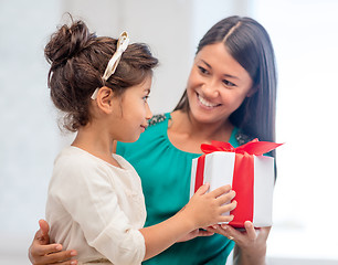 Image showing happy mother and child girl with gift box