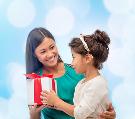 Image showing happy mother and child girl with gift box