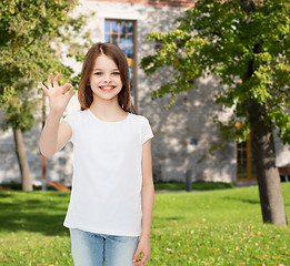 Image showing smiling little girl in white blank t-shirt