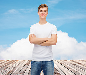 Image showing smiling young man in blank white t-shirt