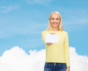 Image showing smiling girl with blank business or name card