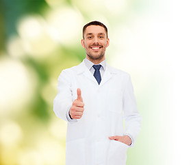 Image showing smiling male doctor showing thumbs up