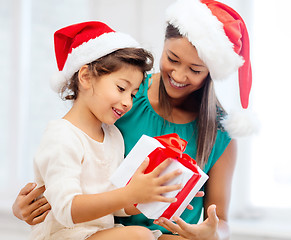 Image showing happy mother and child girl with gift box