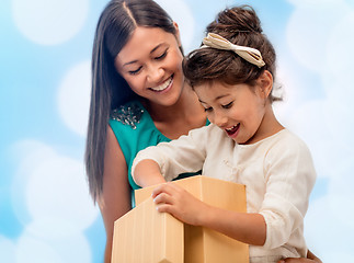 Image showing happy mother and child girl with gift box