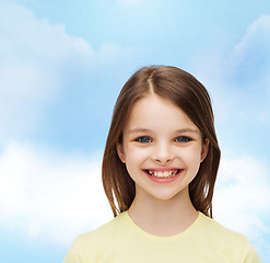 Image showing smiling little girl over white background