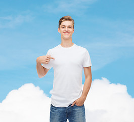 Image showing smiling young man in blank white t-shirt