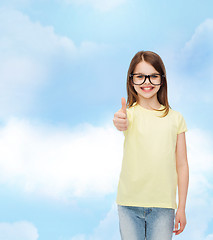 Image showing smiling cute little girl in black eyeglasses