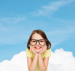 Image showing smiling cute little girl in black eyeglasses