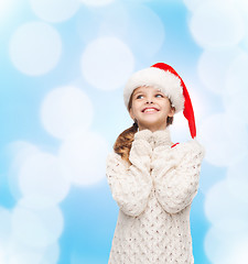 Image showing dreaming girl in santa helper hat