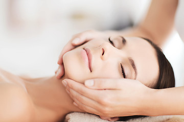 Image showing beautiful woman in spa salon having facial