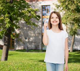 Image showing smiling little girl in white blank t-shirt