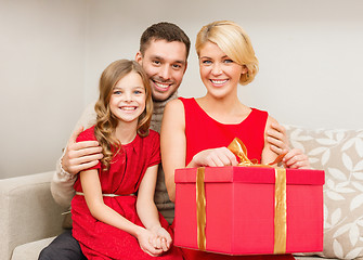 Image showing happy family opening gift box