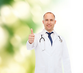 Image showing smiling doctor with stethoscope showing thumbs up