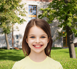 Image showing smiling little girl over white background