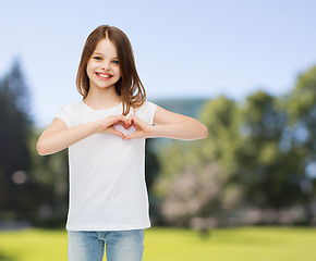 Image showing smiling little girl in white blank t-shirt