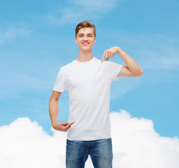 Image showing smiling young man in blank white t-shirt