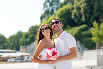 Image showing smiling couple in city