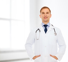 Image showing smiling male doctor in white coat with stethoscope