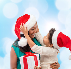 Image showing happy mother and child girl with gift box