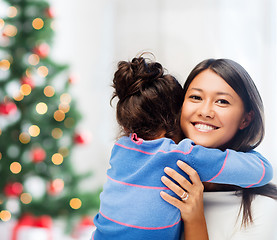 Image showing hugging mother and daughter