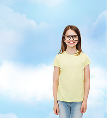 Image showing smiling cute little girl in black eyeglasses