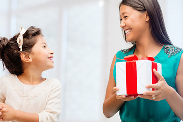 Image showing happy mother and child girl with gift box