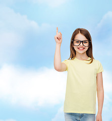 Image showing smiling cute little girl in black eyeglasses