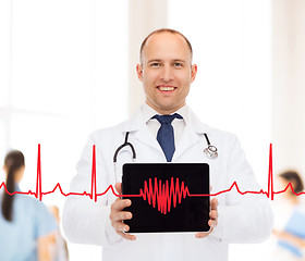 Image showing smiling male doctor with stethoscope and tablet pc