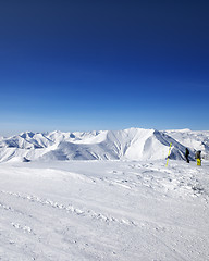 Image showing Snowboarders on ski slope