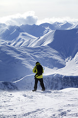 Image showing Snowboarder on top of off-piste slope