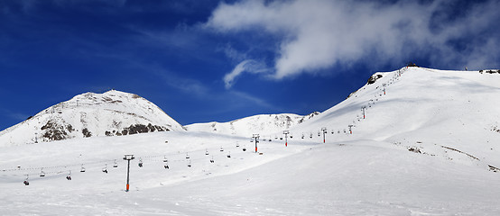 Image showing Panorama of ski slope at sunny winter day