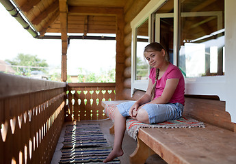 Image showing Sitting on balcony
