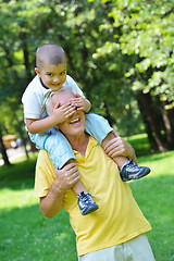 Image showing happy grandfather and child in park