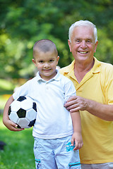 Image showing happy grandfather and child in park