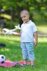 Image showing boy with airpane