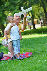 Image showing happy grandfather and child in park