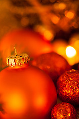 Image showing Warm gold and red Christmas candlelight background