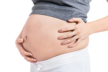 Image showing Happy beautiful young pregnant woman