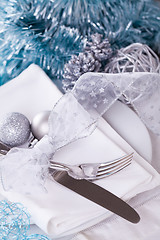 Image showing Stylish blue and silver Christmas table setting