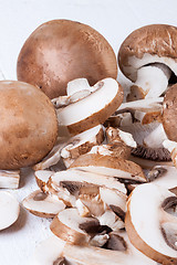 Image showing Diced and whole agaricus brown button mushrooms