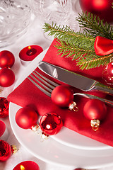 Image showing Red themed Christmas place setting