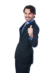 Image showing Enthusiastic businessman giving a thumbs up