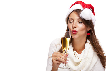 Image showing Playful woman celebrating Xmas blowing a kiss