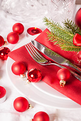 Image showing Red themed Christmas place setting