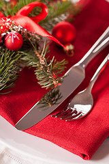 Image showing Red themed Christmas place setting