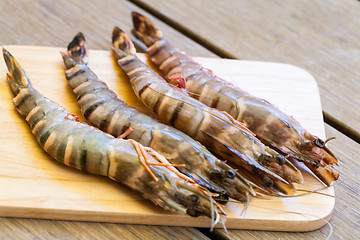 Image showing Four fresh whole tiger prawns