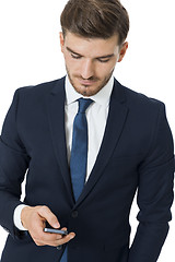 Image showing Stylish businessman chatting on his mobile