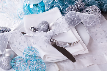 Image showing Stylish blue and silver Christmas table setting