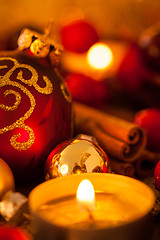 Image showing Warm gold and red Christmas candlelight background